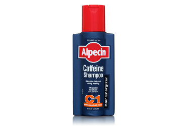 bottle of alpecin caffeine shampoo