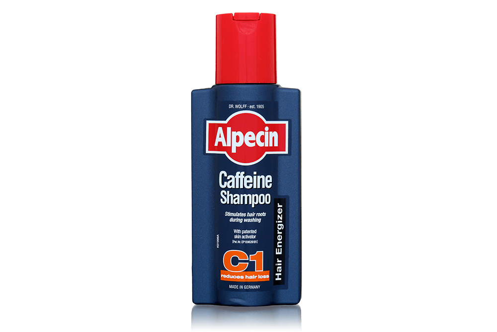 bottle of alpecin caffeine shampoo