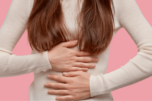 Woman getting relief from indigestion with acid reflux treatment